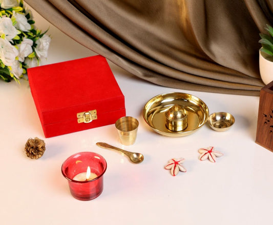 Brass pooja thali set displayed open in a premium red box, featuring pooja plate
brass, diya and accessories, ideal for daily worship and gifting.