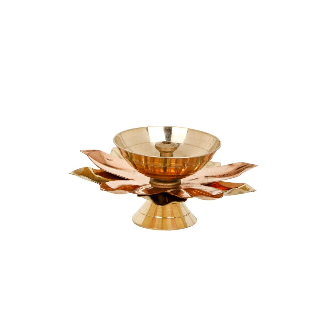 Brass plate with lotus diya set arranged neatly in a gift box, combining pooja plate brass with an elegant lotus shaped diya.