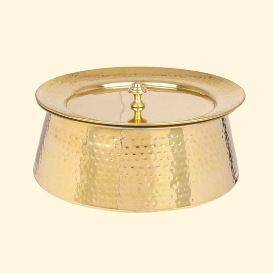 Hammered brass handi with lid featuring tin-coated interior, shown as pure brass
cookware ideal for traditional brass cooking utensils.