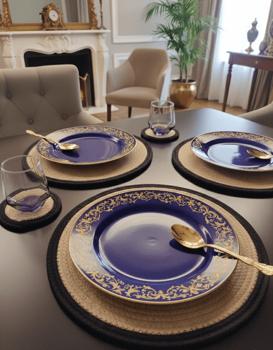 Dining table setup with blue plates placed over woven mats for round table placemats.