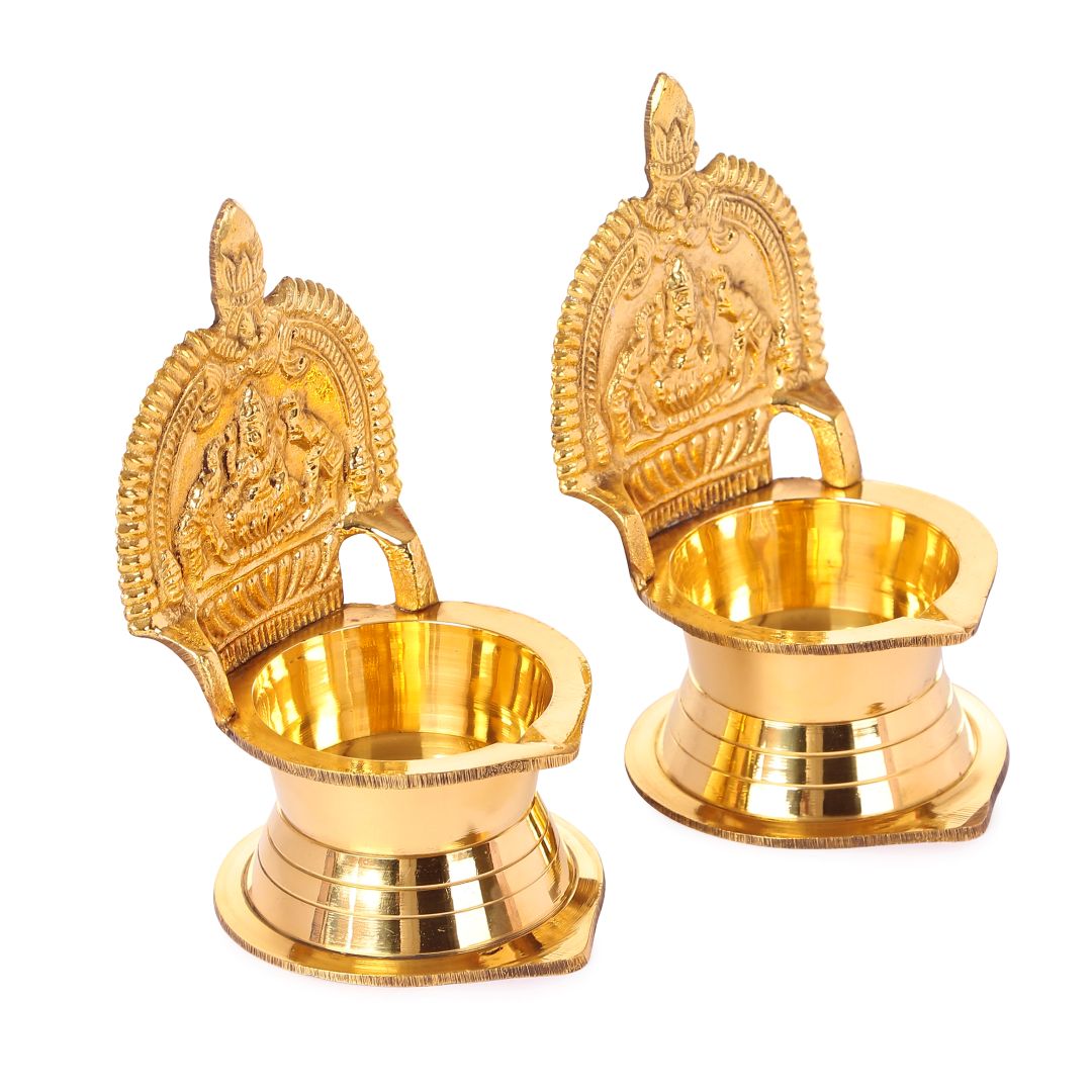 Brass puja lamp with Kamatchi design used in temple rituals
