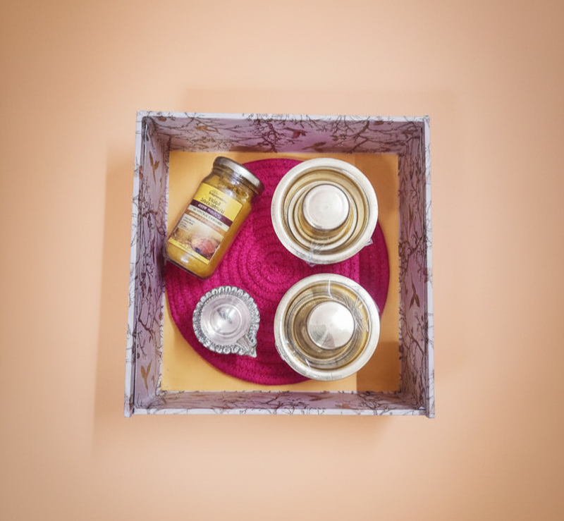 Elegant brass dabara set arranged with honey jar in a patterned gift box, styled as 
a traditional dabara gift set for festive and thoughtful premium gifting.​