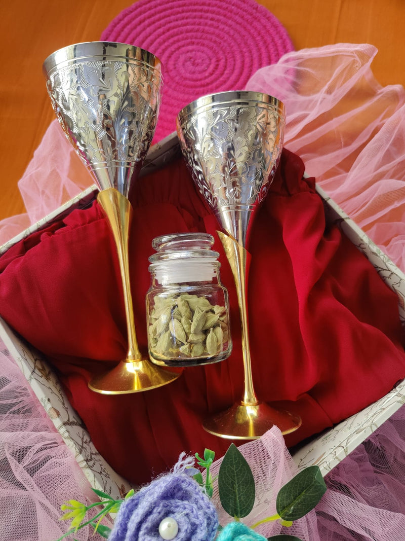 Elegant Spice & Sip Luxe Hamper featuring engraved brass wine glasses and a small spice jar presented in a premium gift box.