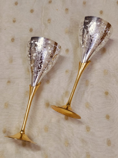 Brass cocktail glasses with intricate engraving, perfect for premium wine gifting.