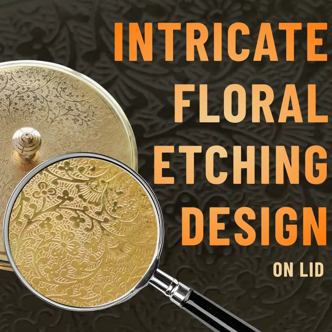 Gold lid with intricate floral etching design, magnified by a magnifying glass, on a dark textured background with text 'Intricate Floral Etching Design on Lid'.