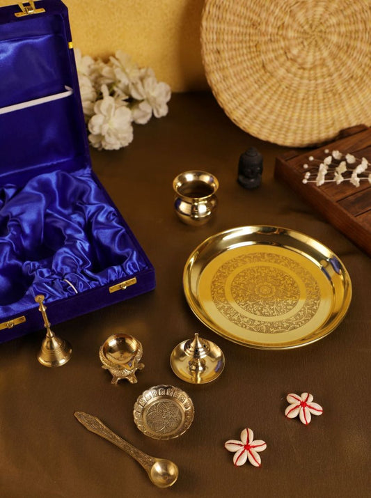 Elegant brass thali for puja displayed with diya and bowls, showcasing brass pooja thali 7 inch set designed for festive rituals