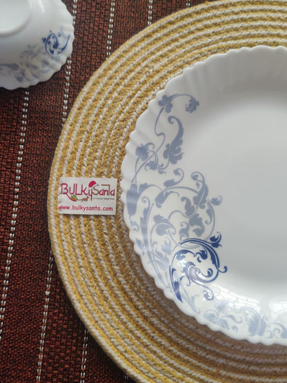 Yellow cotton mat featured in a festive setup with candles and ornaments, ideal
for washable round placemats.